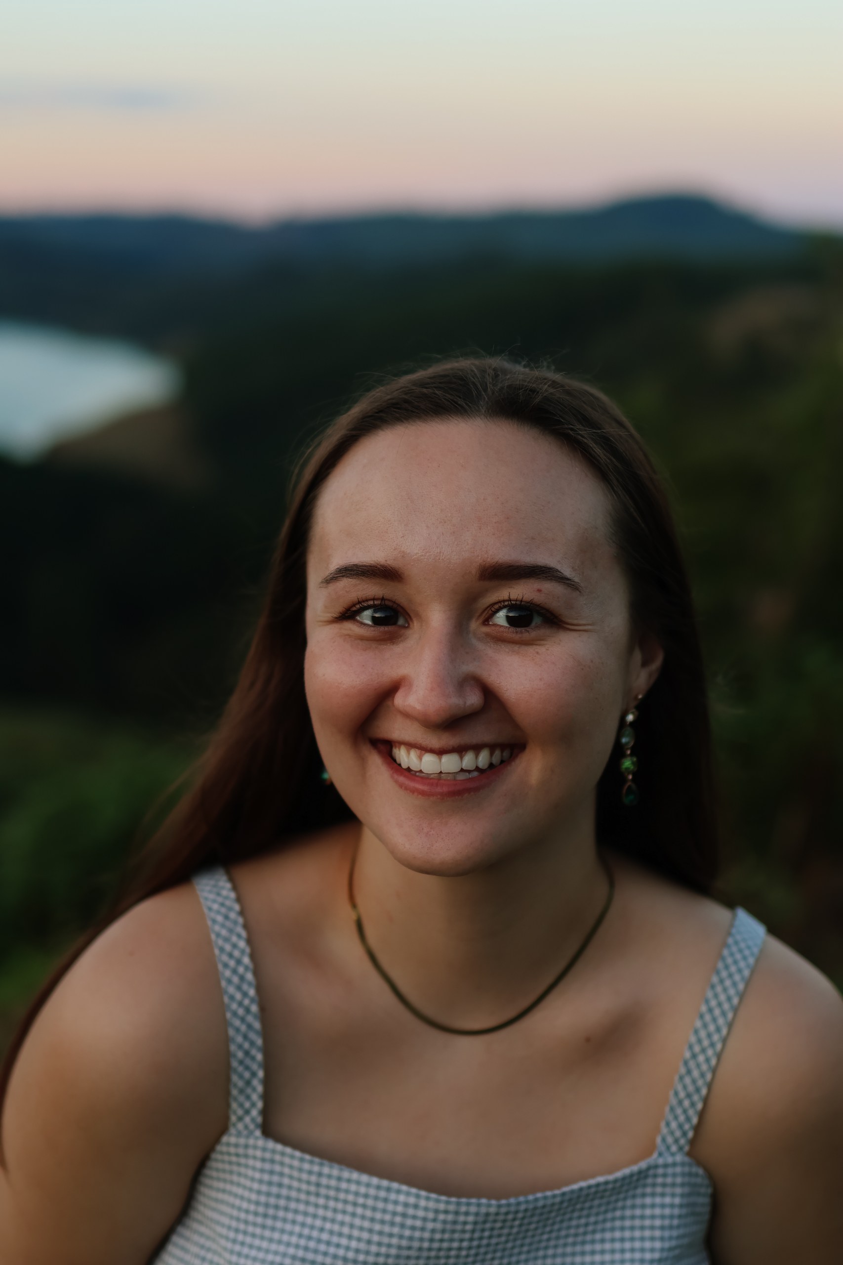 Zoë Montague, photographer, holding her camera